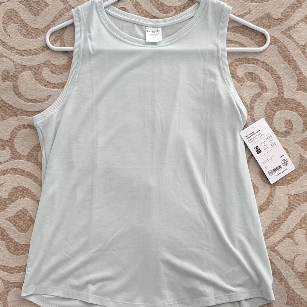 Athleta Brand. With ease open back tank size small color is glacier.